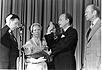 President Gerald Ford observes Dr. Donald S. Fredrickson taking his oath of office as Director of the National Institutes of Health on July 1, 1975.