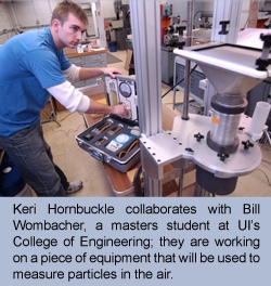 Hornbuckle collaborates with Bill Wombacher, a masters student at UI's College of Engineering; they are working on a piece of equipment that will be used to measure particles in the air.