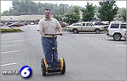 Shane Latham uses a Segway Human Transporter as a way to get around without a wheelchair.