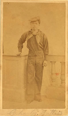 Photo:  African American man, Charles Batties(?), full-length portrait standing, facing front, wearing sailor uniform.