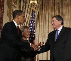 Date: 01/22/2009 Description: Secretary of State Hillary Rodham Clinton applauds as President Barack Obama congratulates Special Representative to Pakistan and Afghanistan Richard Holbrooke, Thursday, Jan. 22, 2009, at the State Department.  © AP Photo