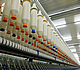Cotton yarn spools in textile factory