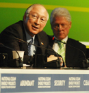 Secretary of the Interior Ken Salazar and Former President Bill Clinton at the National Clean Energy Project Conference on Feb. 23, 2009. [Photo by Tami Heilemann, DOI]