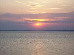 image of sunset over water