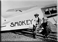 Photo of Homer Pickens, assistant to the New Mexico State Game Warden, accompanied 
young Smokey on the flight to Washington DC in June 1950. 