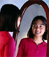 Girl in front of mirror