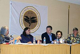 Assistant Secretary Artman sitting at long table with tribal leaders