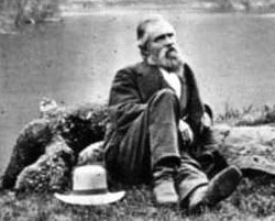 Galen Clark sits beside a Yosemite lake