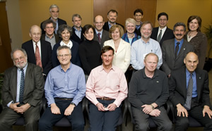 National Advisory Council for Human Genome Research, February 2009: Sitting (l-r): Mark Guyer, Michael Boehnke, David Page, Eric Boerwinkle, and Alan Guttmacher. Second Row (l-r): Richard Weinshilboum, David Valle, Pilar Ossorio, Caryn Lerman, Paul Sternberg, Patrice Milos, Pearl O'Rourke, Richard Myers, and Geoffrey Ginsburg. Back Row (l-r): Richard Cooper, Rex Chisholm, Richard Gibbs, Mark Chee, Jorge Contreras, and Claire Fraser-Liggett