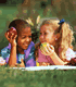 Two Children Eating Apples