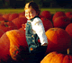 Child with Pumpkins