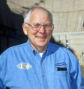 Former Commissioner John Keys wearing blue 100th anniversary shirt at Hoover Dam
