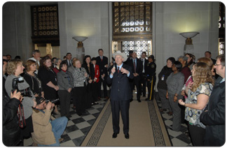 Secretary Salazar talks with Headquarters employees who welcomed him to Interior at the main entrance lobby on his first day in his new position