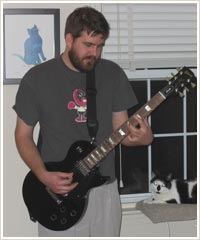 Jake playing the guitar