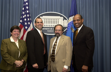 MOU Signatories:  Under Secretary of Natural Resources and Environment Mark Rey (third from left) is joined by Michael T. Goergen, Jr., SAF’s Executive Vice President and CEO (second from left); Jessica G. Strother, member, SAF’s Certification Review Board; and Lawrence Clark, NRCS’ Deputy Chief for Science and Technology.