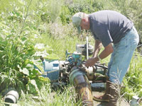 Man checking a pump