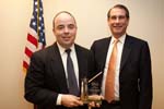 Corporation board chair Alan Solomont congratulates outgoing board member Vince Juaristi for his service to the agency. On February 4, 2009, the Corporation for National and Community Service held a public board meeting at the Corporation's Washington, DC headquarters.