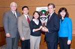 Tulane University receives the President's Higher Education Community Service Honor Roll for Hurricane Relief. Pictured (L-R): Scott Cowen, President; Vincent Ilustre, Director for Public Service; Faye Kim, Program Coordinator, Center for Public Service; Stephen Goldsmith, Chairman of the Board, Corporation for National and Community Service; and Amy Cohen, Director, Learn and Serve America.