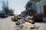 Debris litters the sidewalks along the main commercial strip in downtown Pass Christian, Miss., more than four weeks after Hurricane Katrina hit, closing down all businesses in the city.