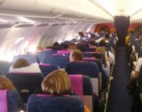 People sitting on a plane.