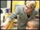 Secretary Spellings talks with students during a computer-based lesson at Capitol View Elementary School.