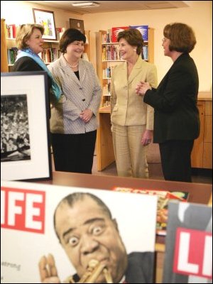 Secretary Spellings and Mrs. Bush meet with school officials about the The Laura Bush Foundation for America's Libraries' Gulf Coast Library Recovery Initiative grant announcement at St. Bernard School in New Orleans, Louisiana.  White House Photo by Kimberlee Hewitt