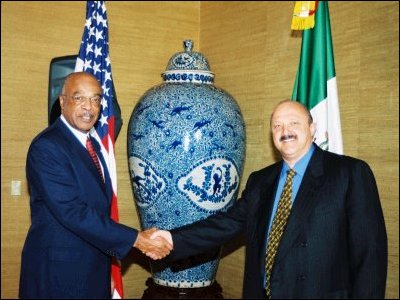 Secretary Rod Paige and Dr. Reyes Tamez Guerra, Mexican Secretary of Education, shake hands at the Education Working Group after the Memorandum of Undertstanding (MOU) signing of a new Annex, giving both countries an opportunity to modify existing plans for cooperation.