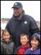 Secretary Paige is greeted by students at the Lewis Angapak Memorial School in the village of Tuntutuliak, Alaska.