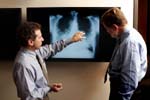 Photo of NIEHS researchers with lung xray