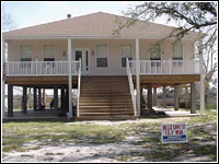 Robert and Sandra Harris' elevated house was the only one left standing on Wiggins Street after Hurricane Katrina hit. They had mitigated their home in 1999 with Increased Cost of Compliance funds through the National Flood Insurance Program. They elevated their house above the required level in order to further protect against flooding. Photo by Robert Harris