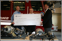 L to R Grant writer LT Dean Shelton, Fire Chief Greg Corn and FEMA FCO Dolph Diemont. FEMA Newsphoto Mike Howard.