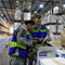 Army Sgt. Garciela Raffler and Spec. Nicholas Donahue, 690th Military Police, Florida National Guard, coordinate medical supplies for distribution from the State of Florida Logistics Response Center. All part of the cooperative preparation to meet the Tropical Storm Fay response. Barry Bahler/FEMA 