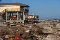 Debris lines the beach on Galveston Island