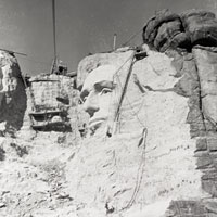 Photo of Lincoln figure on Mount Rushmore, 1937