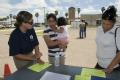 FEMA community relations worker speaks with Texas resident