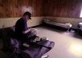 Hurricane Ike Survivor Eating Alone in Red Cross Shelter