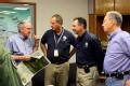 FEMA Administrator Paulison with FEMA and local officials in Iowa