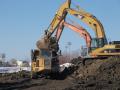 Construction crews work a pile of dirt in Fargo, North Dakota