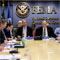 FEMA Deputy Administrator, Harvey E. Johnson, Jr. (L- yellow tie) and FEMA Assistant Administrator/Disaster Operations Directorate, Glenn Cannon, chair a national Video Teleconference (VTC). Barry Bahler/FEMA