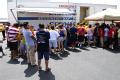 Residents wait in line for clothing in Texas