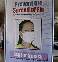A poster on flu prevention is displayed at an isolation room for possible swine flu cases at a hospital in Manila, 04 May 2009