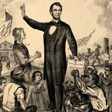 Abraham Lincoln standing with a group of slaves and a woman.