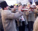 Photo of traditionally dressed Romanian musicians