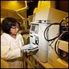 Photo of Scientist Working in Laboratory