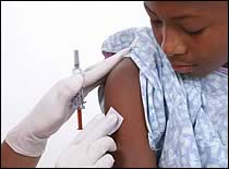 Photo of boy getting vaccinated.