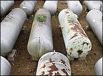 Photo of rusted propane tanks.