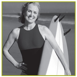 Healthy middle-aged woman with surfboard