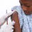 child receiving vaccination