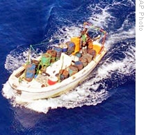 An aerial photo taken by the French Navy on 15 Apr 2009 shows a pirate 'mother ship' east of Mombasa, Kenya