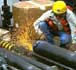 Photograph of a welder working on an offshore platform.